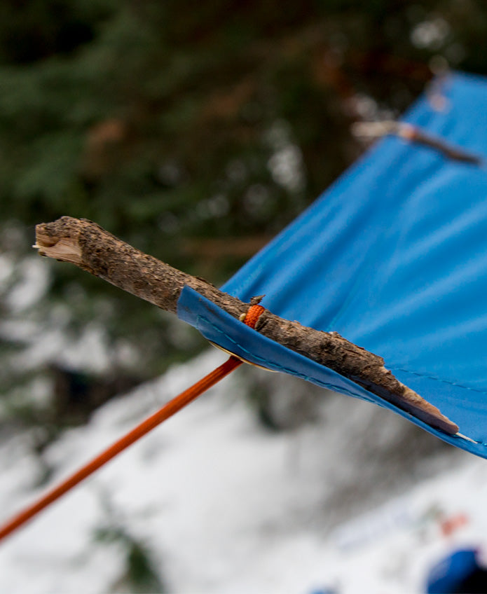 How to erect a lean-to survival tarp